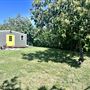 Ranch house with horses and stables
